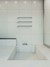 White Bathroom with Heated Towel Rail