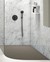 Marble and black shower enclosure