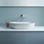 Countertop sink in blue bathroom