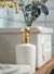 White sink with gold detail